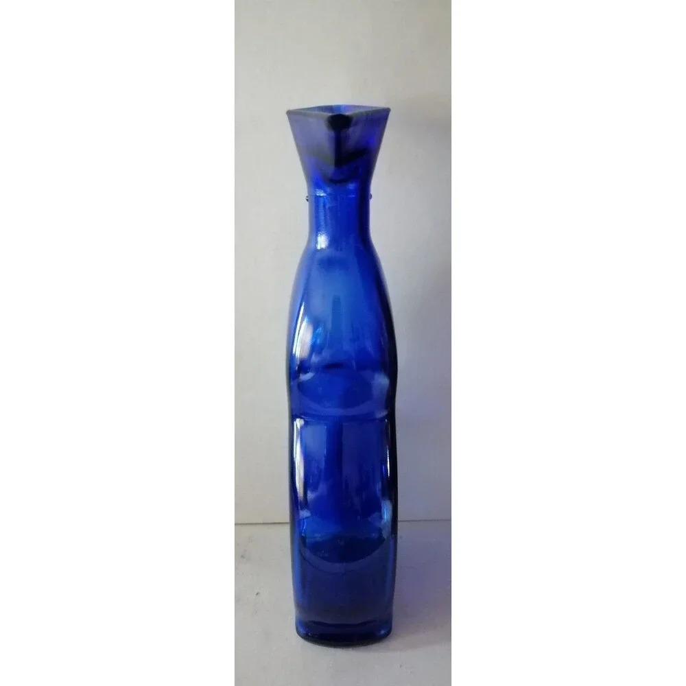 Cobalt blue bottle marked 